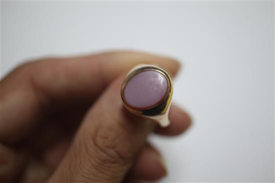 A 9ct gold and carnelian set intaglio ring and a 9ct gold and carnelian set oval signet ring.